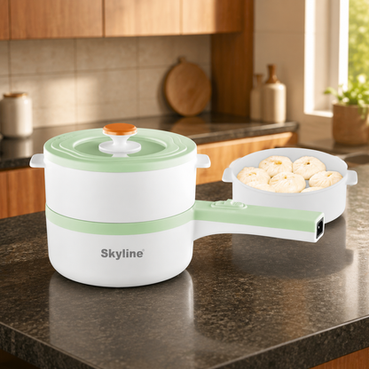 Skyline VTL-2060 mint electric pan with steamer on kitchen countertop